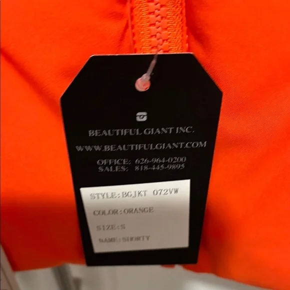 Bright Orange Puffer Vest with Tropical Print Bag - Picture 2 of 7